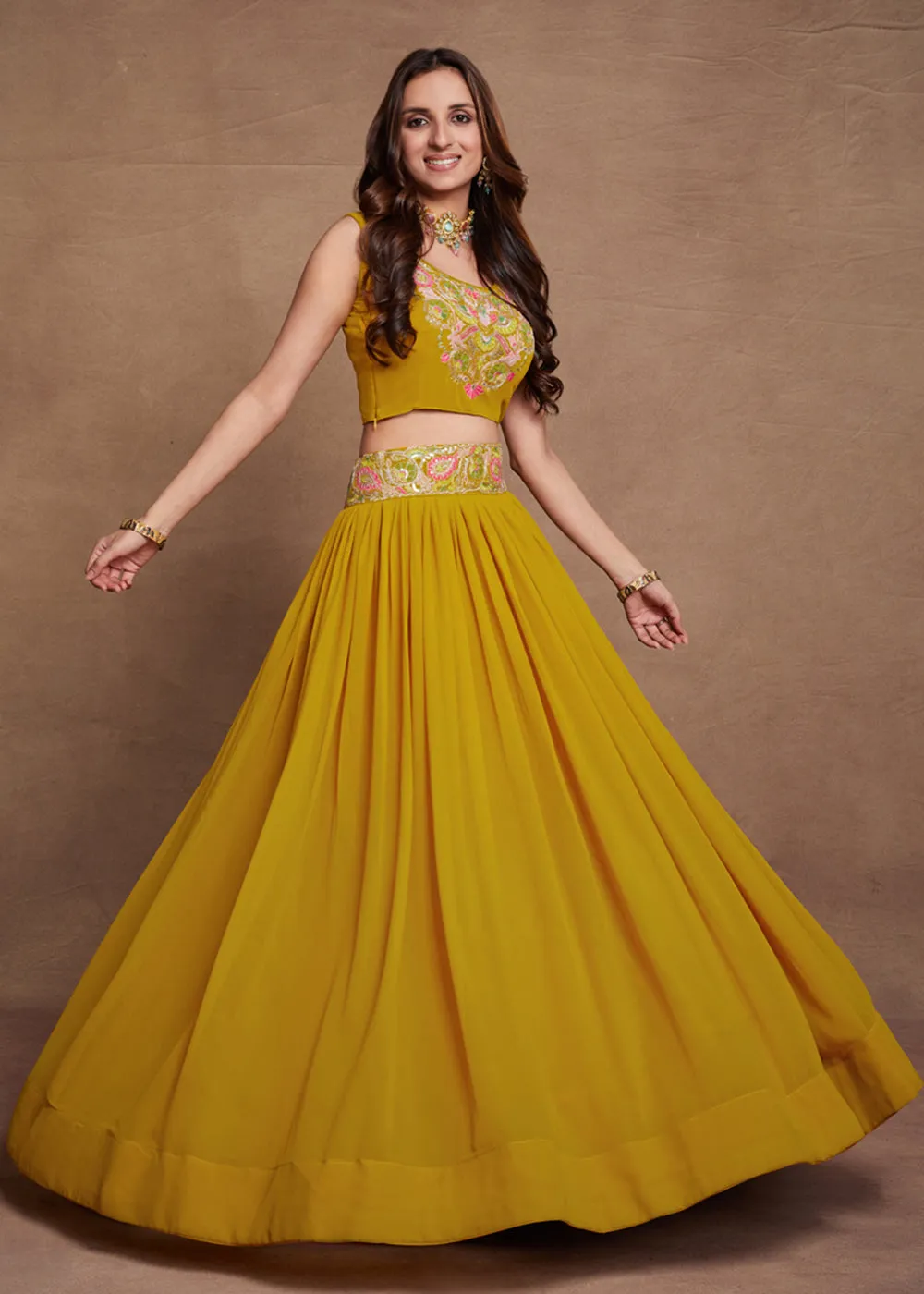 Blooming Georgette Yellow Embroidered Festive Lehenga Choli